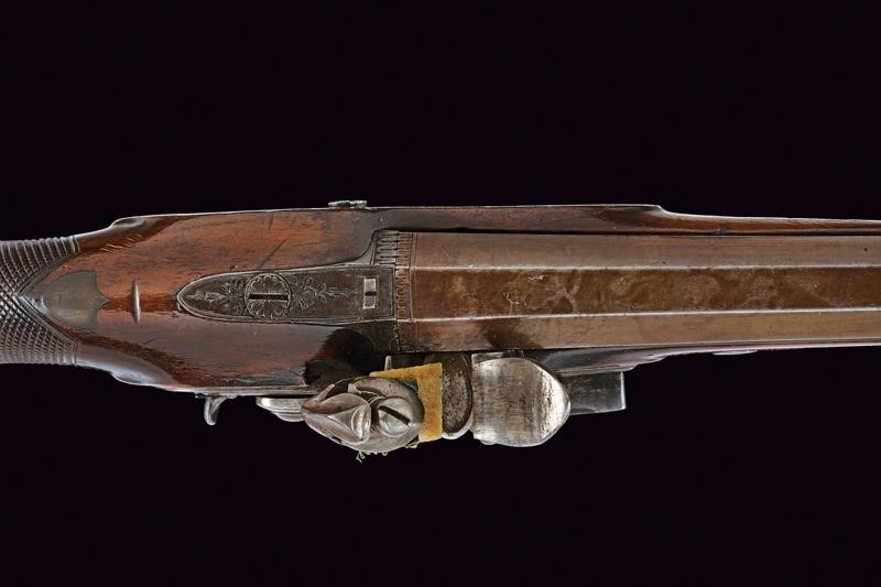 Simpson, Pistola a pietra focaia con cassa in legno