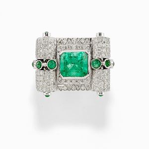 A 18K white gold, emerald and diamond ring, with certificate
