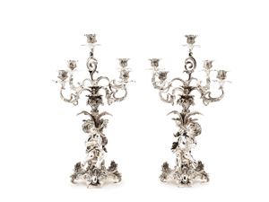 Important pair of candelabras with cherubs