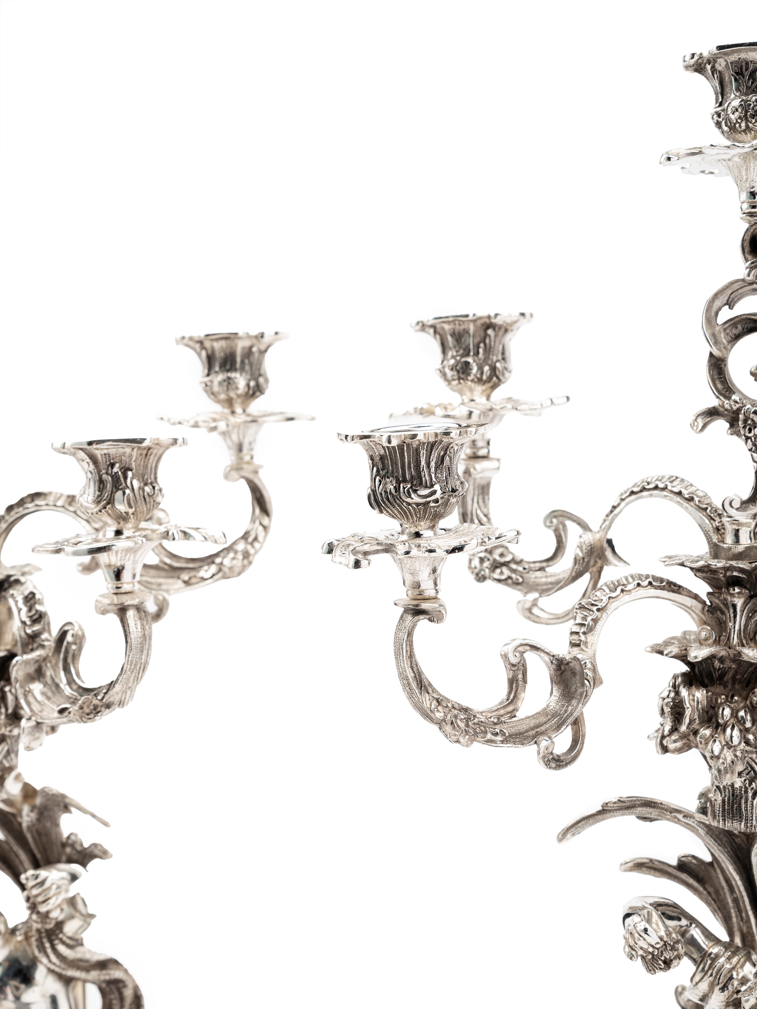 Importante coppia di candelabri con putti