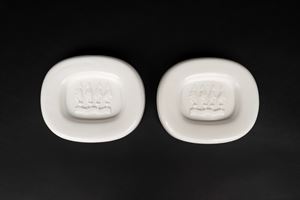 Pair of sculptural bowls in white glass paste