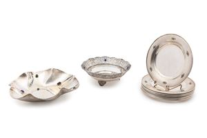 Twelve plates and two bowls with colored glass pastes