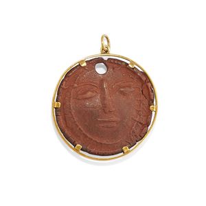Woman's face medallion
