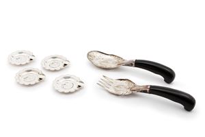 Two salad servers and four ashtrays