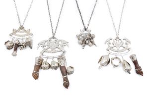 Four amulets "Penca de Balangandan"