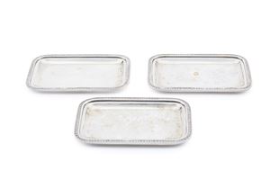 Three pocket-emptying trays