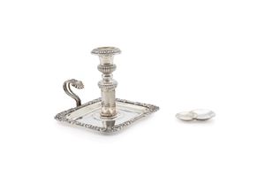 A candle holder and a small bowl
