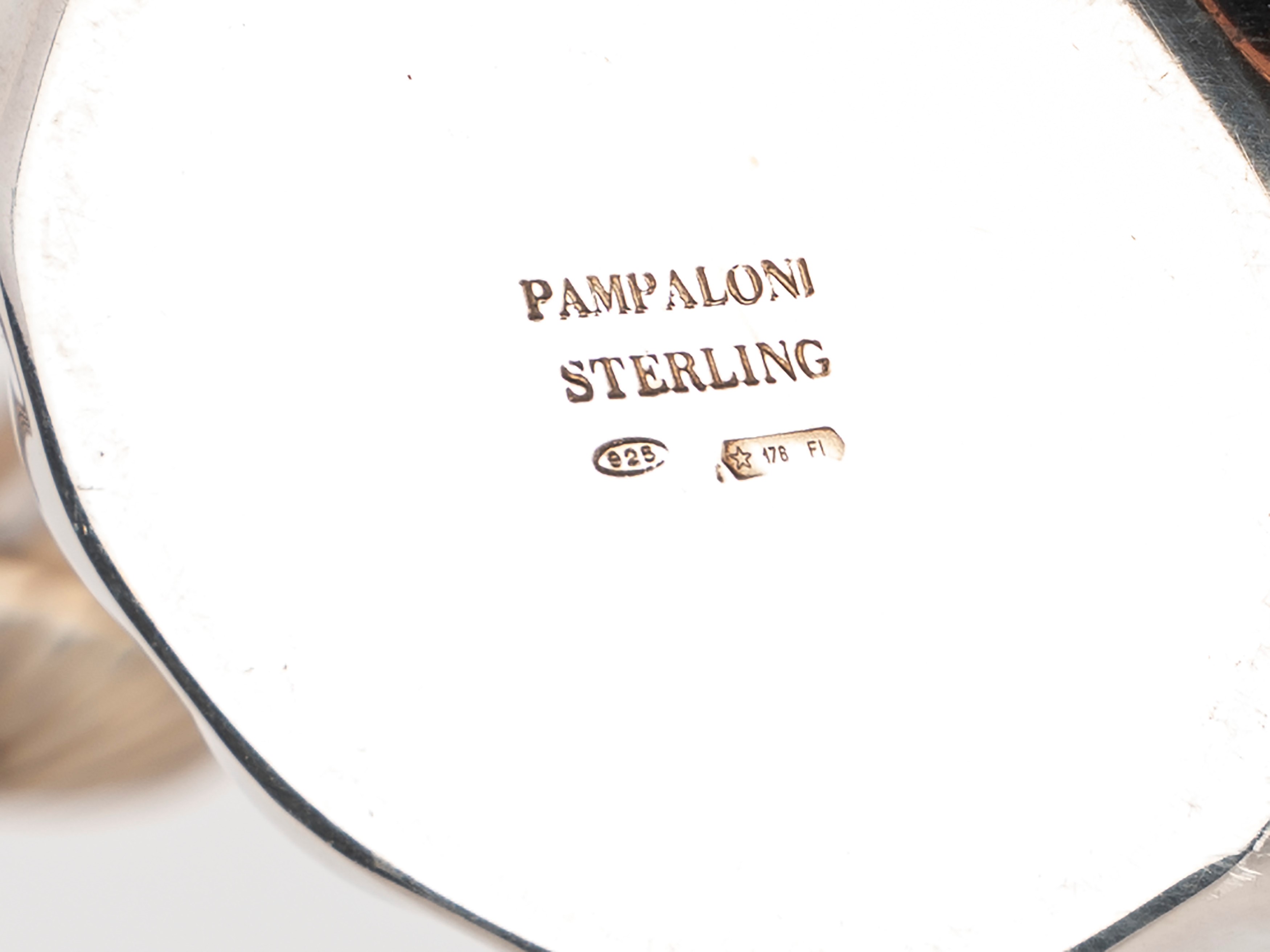 Quattro oggetti firmati