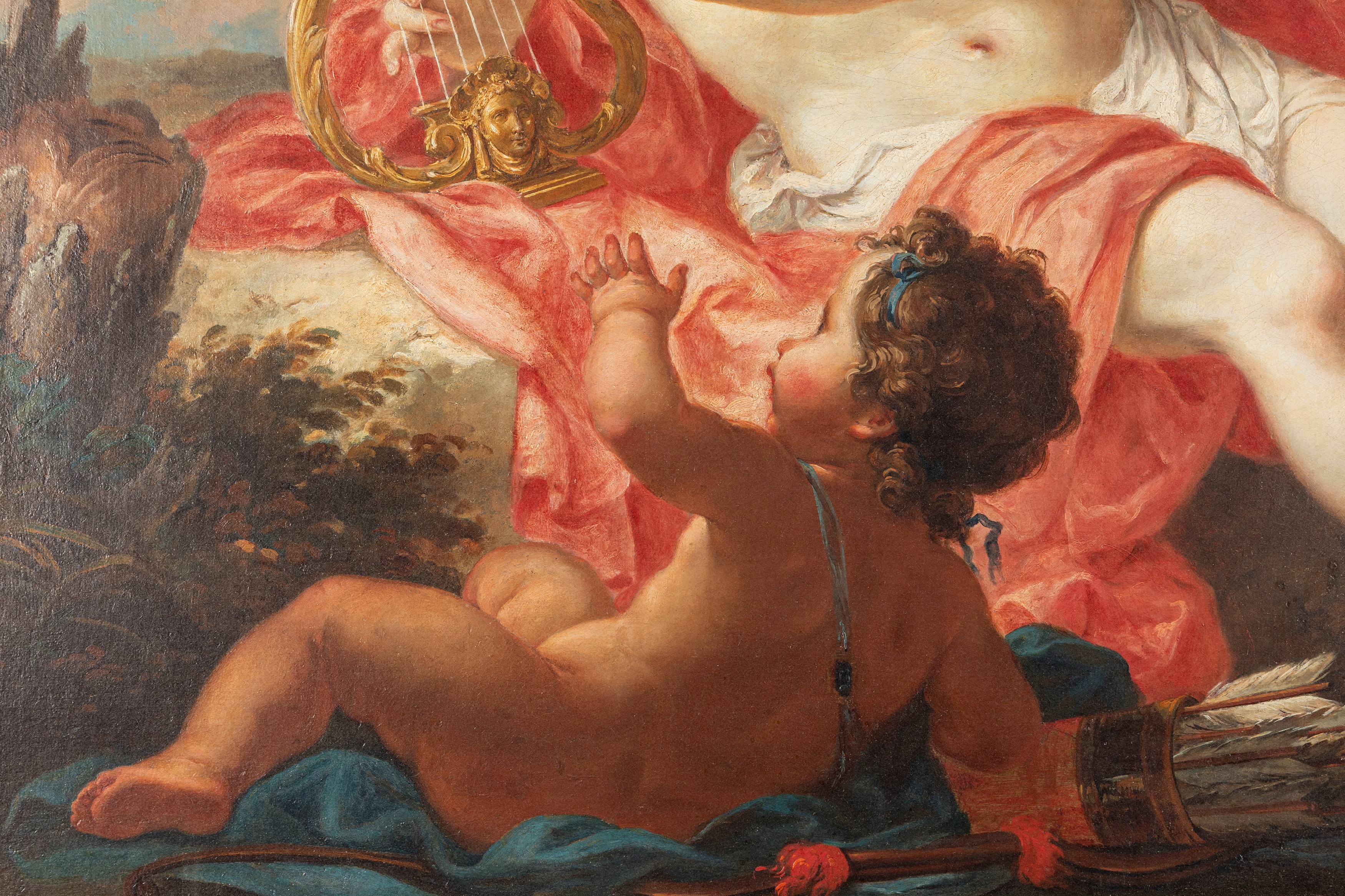 Apollo suona la lira con due putti