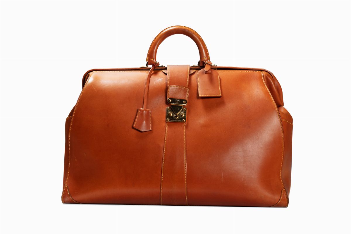 Etichetta per bagagli Louis Vuitton in pelle bordeaux in vendita su 1stDibs