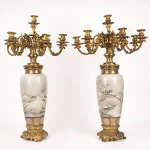 Pair of gilded bronze candlesticks with polychrome porcelain body, 19th century