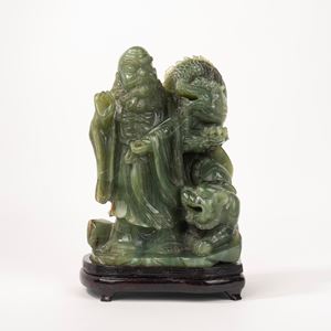 Large sculptural group in green hard stone, China, 20th century