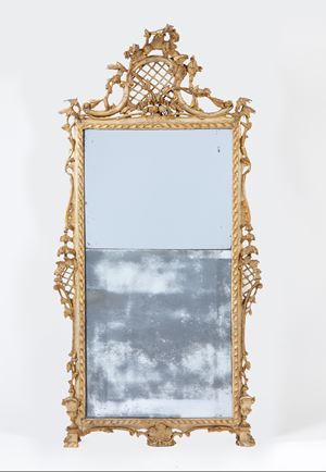 Carved, painted and gilded wooden mirror