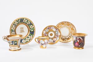 Three polychrome porcelain cups with saucer 