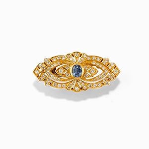 Spilla in oro giallo 18K