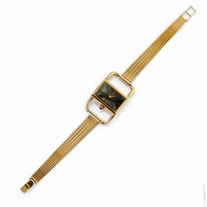 A 18K yellow gold lady's wristwatch, Baume & Mercier (the clasp is not original)