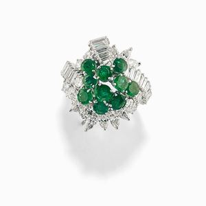 A 18K white gold, emerald and diamond ring