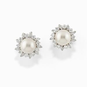 A 18K white gold, cultured pearl and diamond earrings