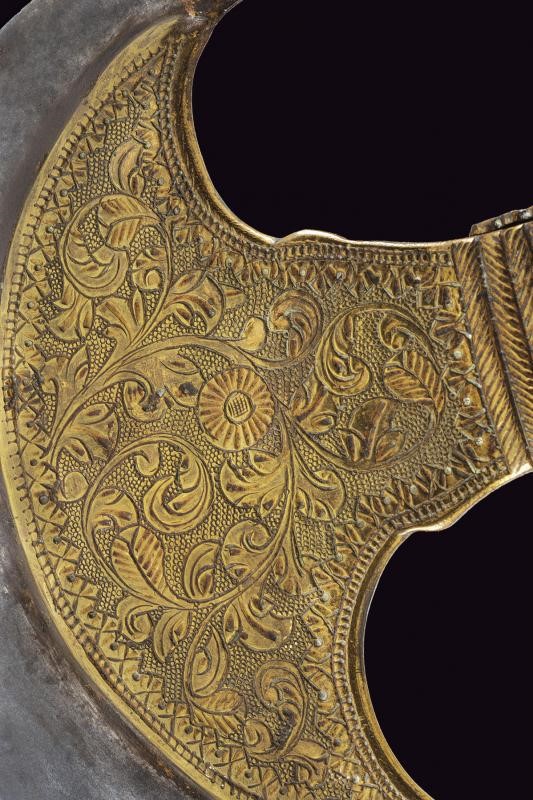 Ascia ornata in ferro e ottone, 1880 circa