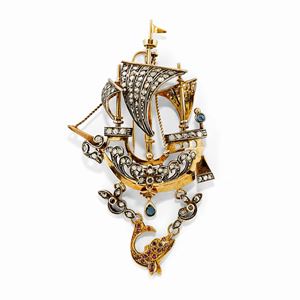 A silver, 18K yellow gold, diamond, ruby and sapphire brooch