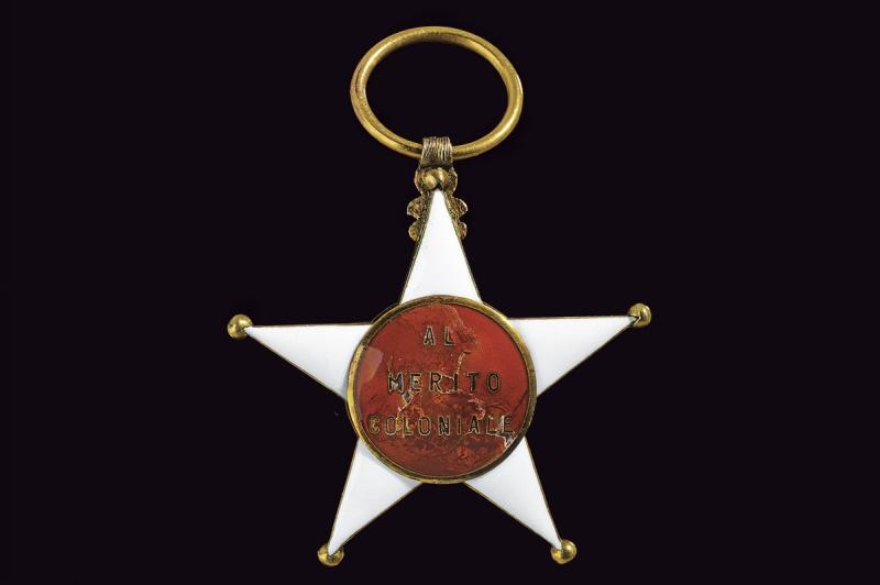Ordine coloniale della Stella d'Italia, croce da cavaliere in metallo dorato e smaltato