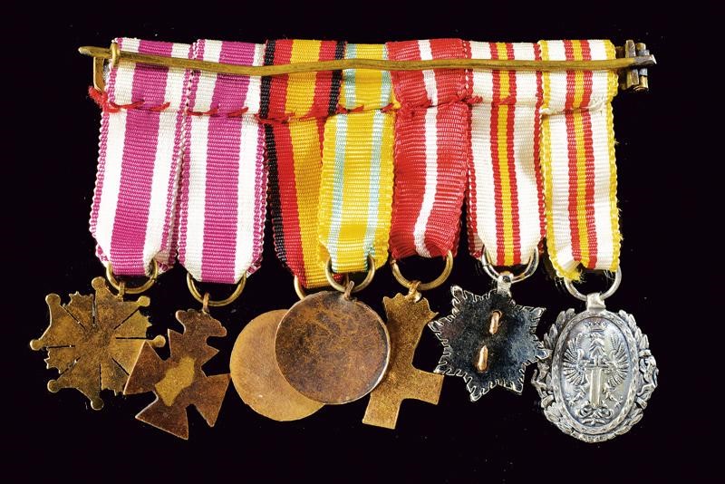 Barretta con sette miniature