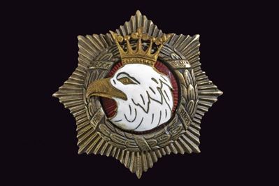 Distintivo, bronzo con testa d'aquila smaltata e marcatura A. PANASIUK WARSZAWA