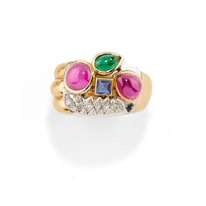 A 18K two-color gold, ruby, emerald, sapphire and diamond ring