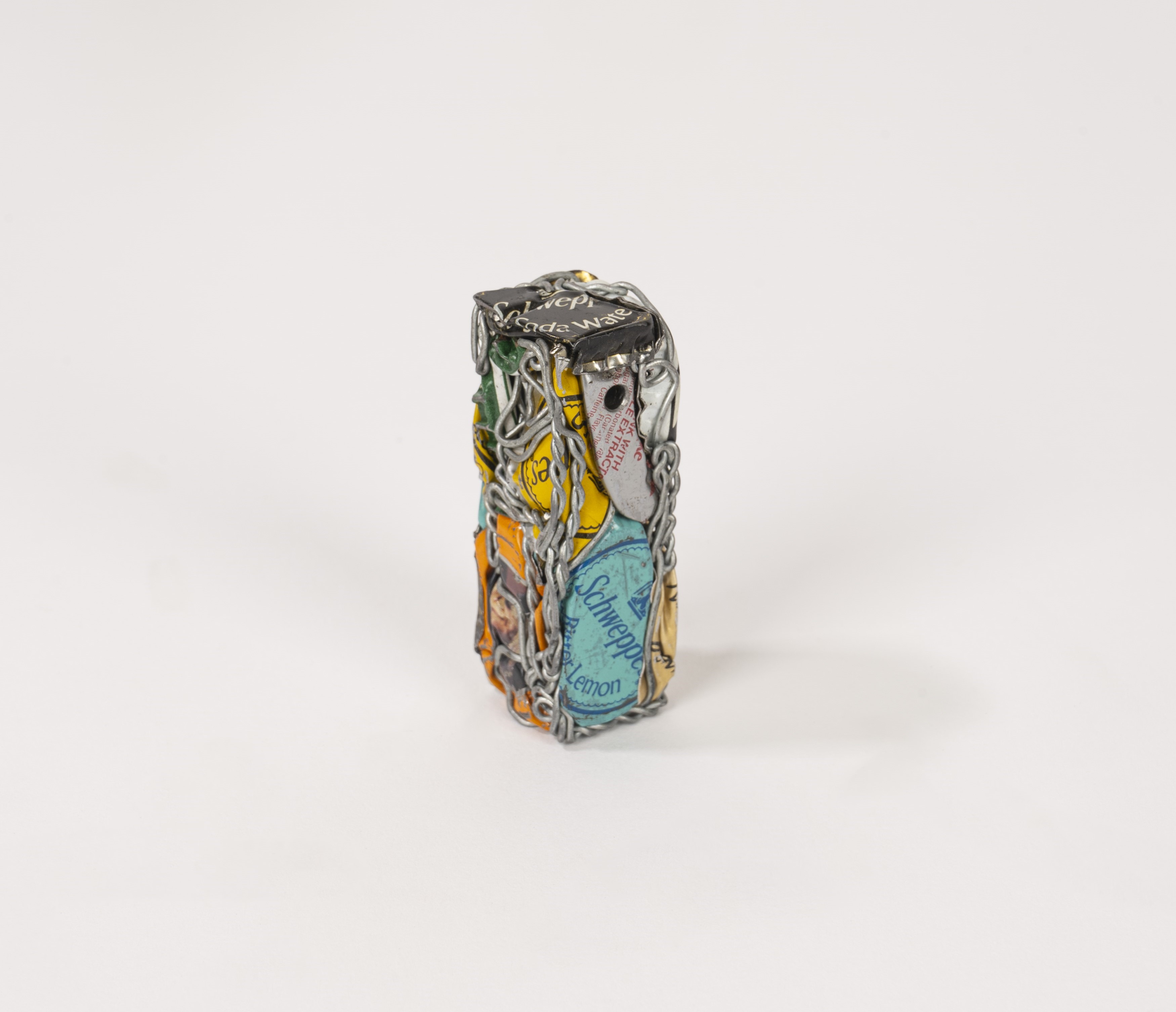 César - Capsules de bouteilles, compressione