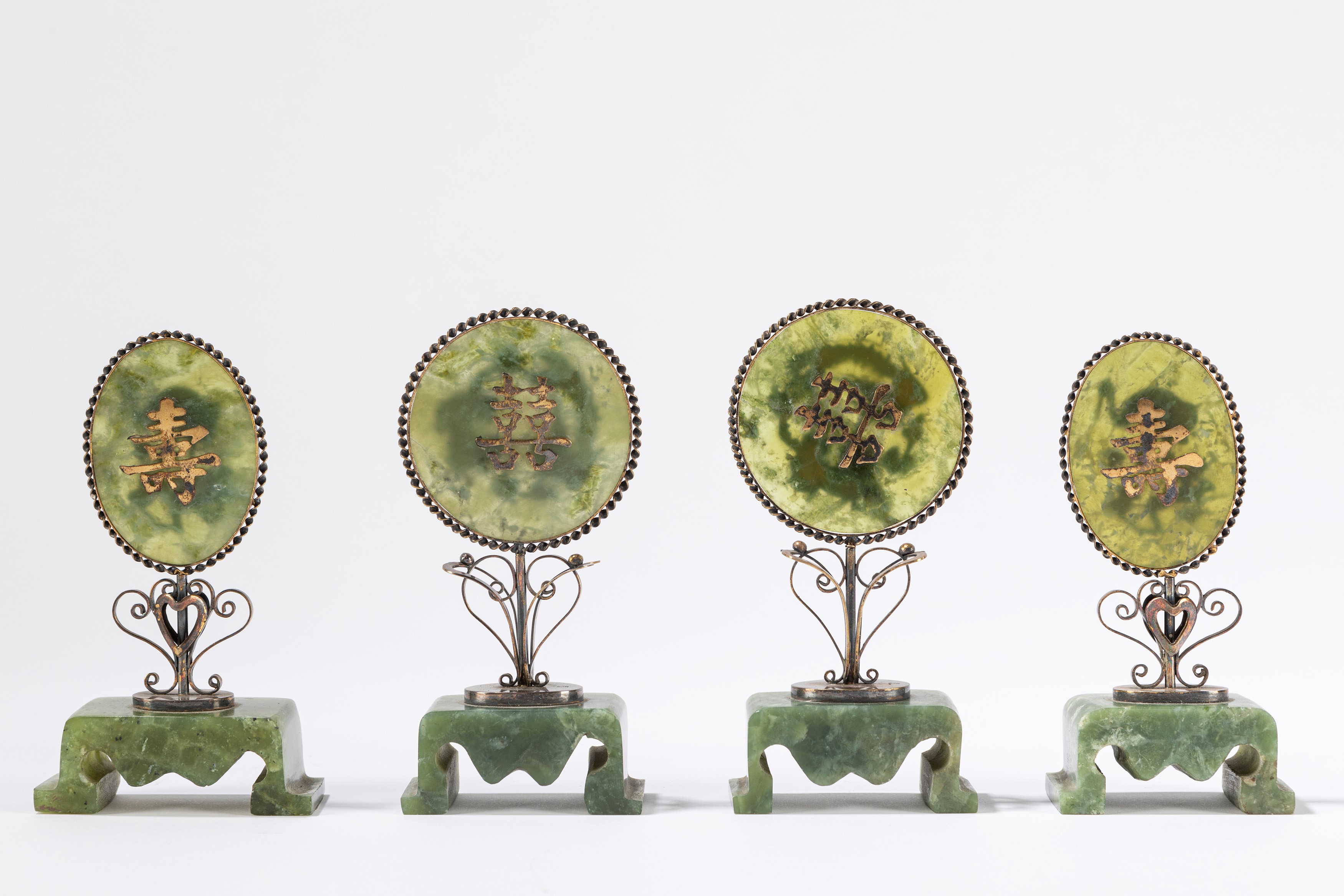 Quattro piccole placche in giada verde