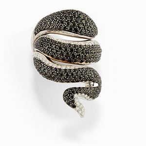 A 18K two-color gold, uncolored and black diamond ring, Gavello