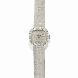 A 18K white gold and diamond lady's wristwatch, Omega