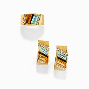 A 18K two-color gold, quartz, amethyst, diamond and onyx demi parure