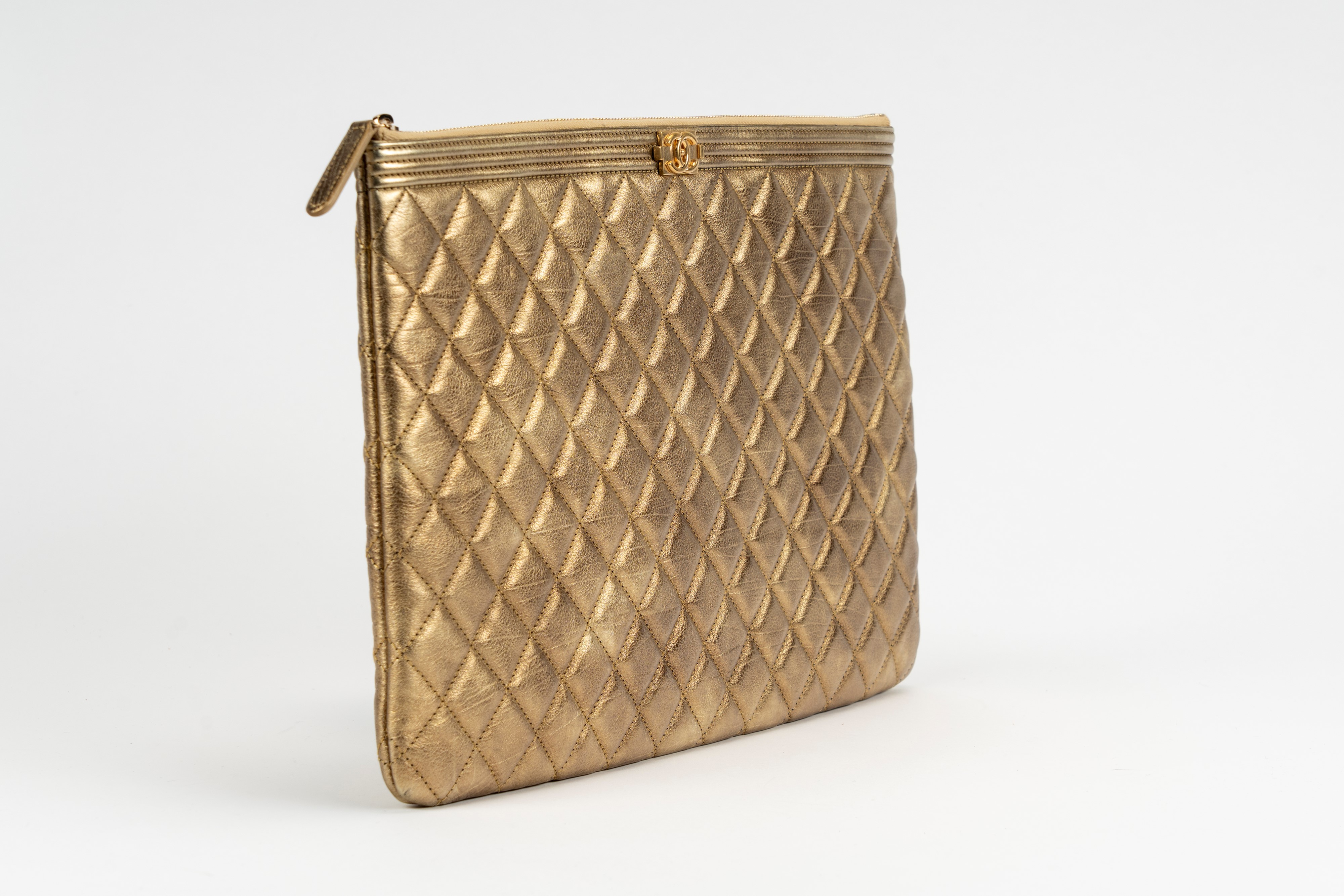 Chanel - Busta in pelle matelassé oro con chiusura a cerniera, 2015