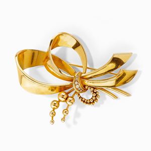 Spilla in oro giallo 18K