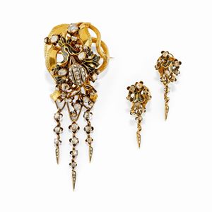 A 18K yellow gold, silver, enamel and diamond demi parure