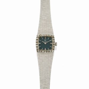 A 18K white gold and diamond lady's wristwatch, Omega