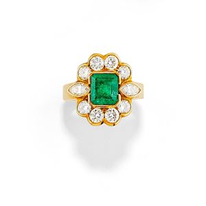A 18K yellow gold, emerald and diamond ring