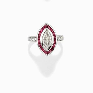 A 18K white gold, diamond and ruby ring, signed Tiffany and Co.