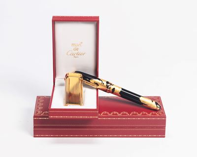 Penna a sfera Dandy edizione limitata e accendino placcato oro con rubino