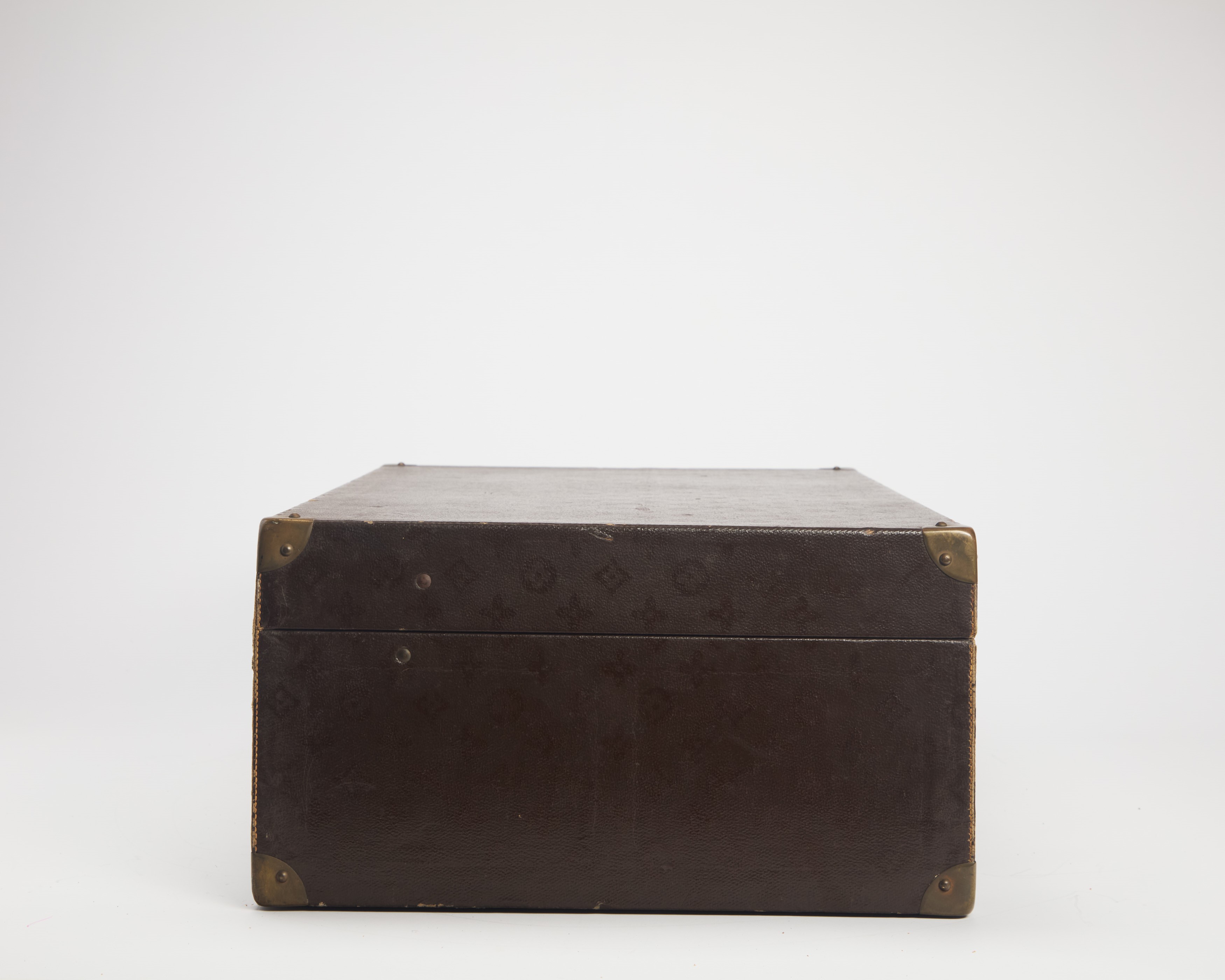 Louis Vuitton - Valigia rigida in tela monogram con maniglia in cuoio