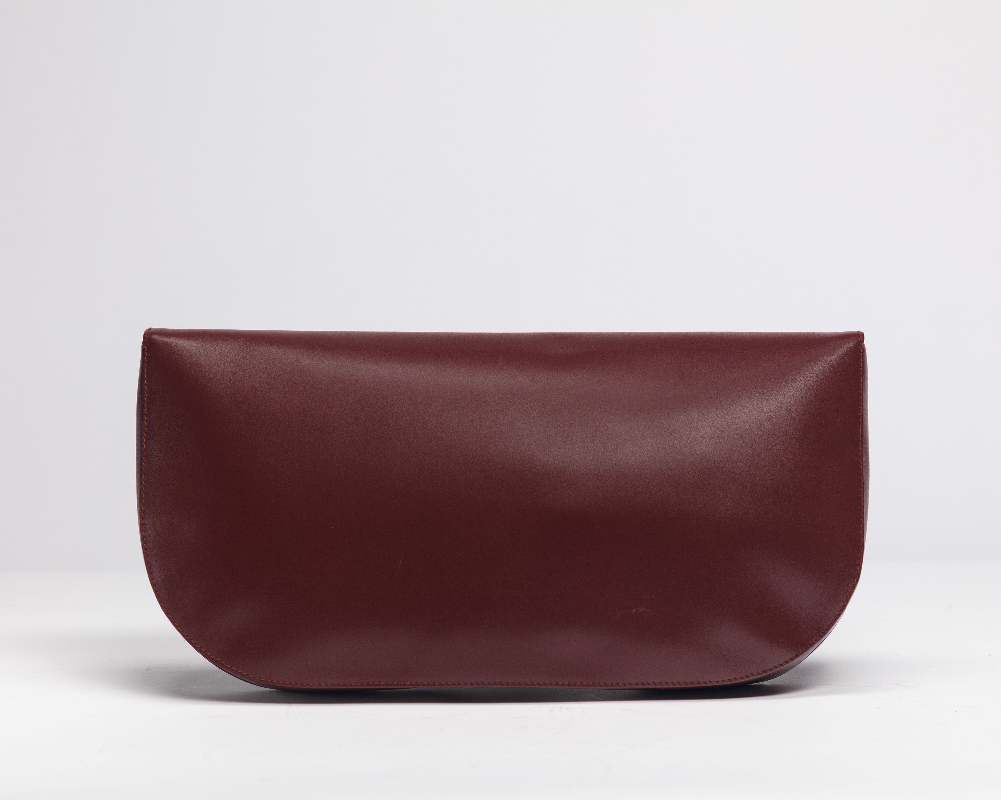 Cartier - Pochette in pelle burgundy con interno monogrammato