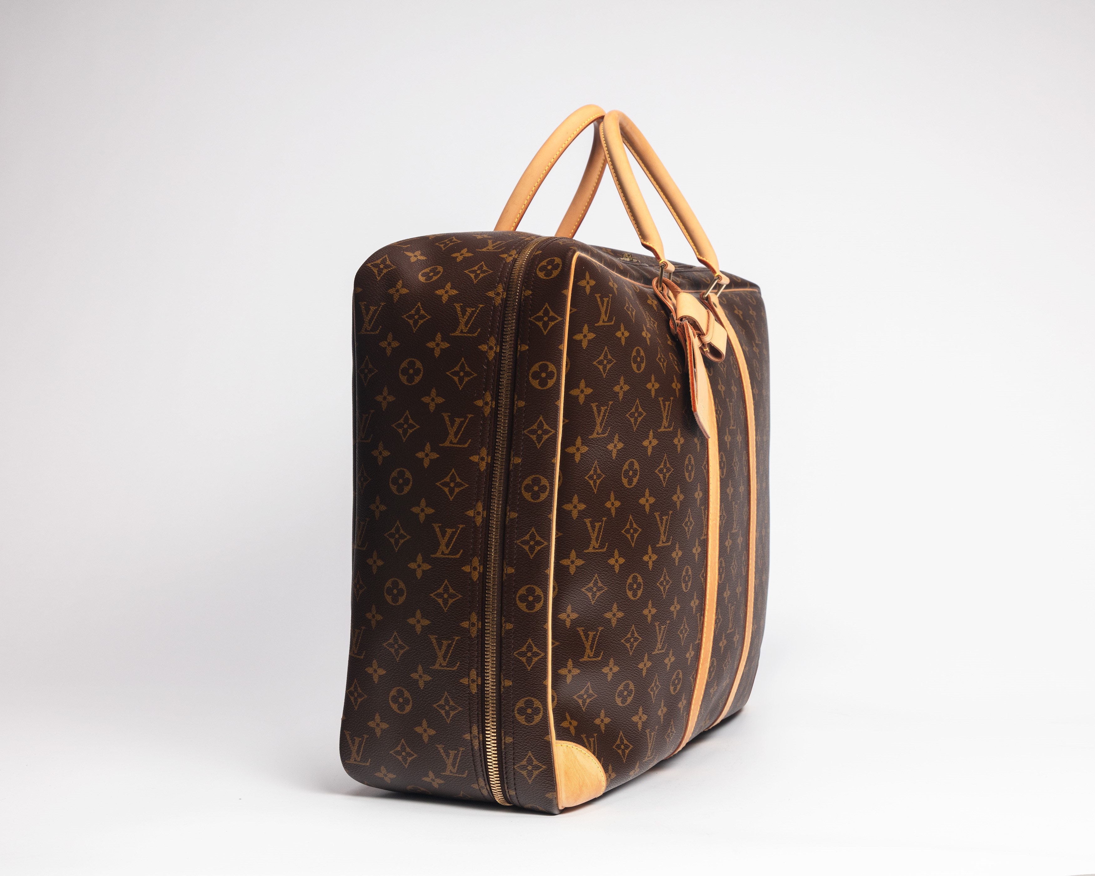 Louis Vuitton - Valigia morbida in tela Monogram con profili in vacchetta