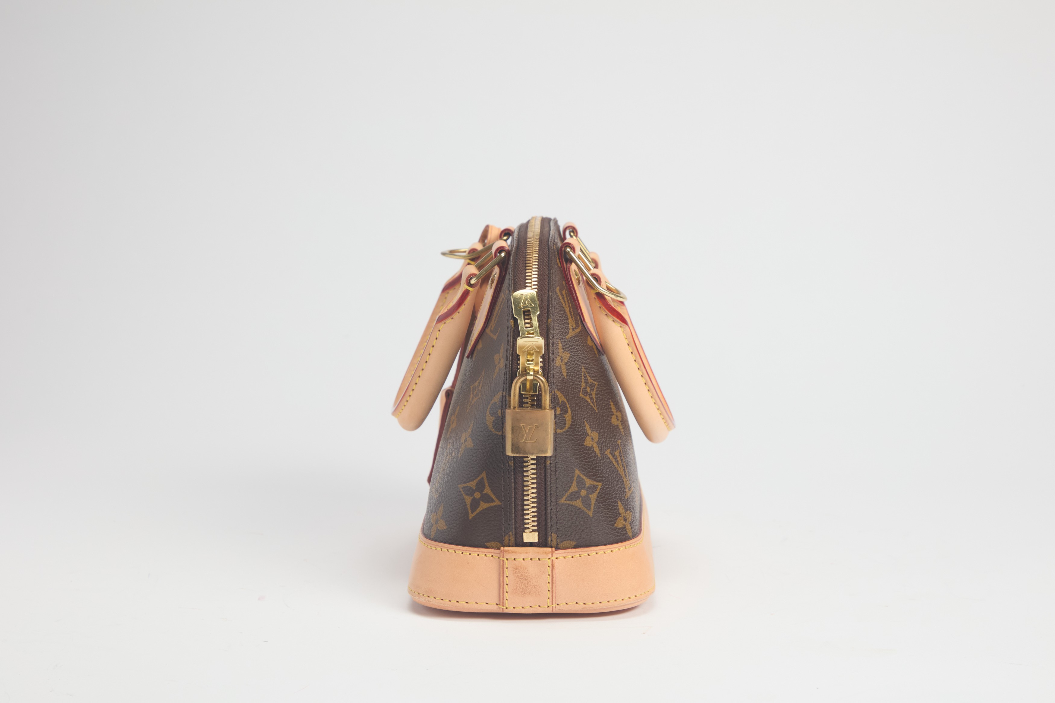 Louis Vuitton - Mini borsa Alma in tela monogram con tracolla