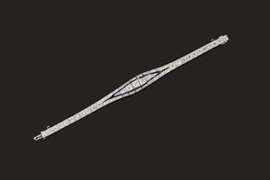 A platinum, diamond and synthetic sapphire bracelet
