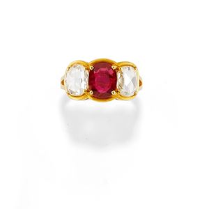 A 18K yellow gold, ruby and diamond ring