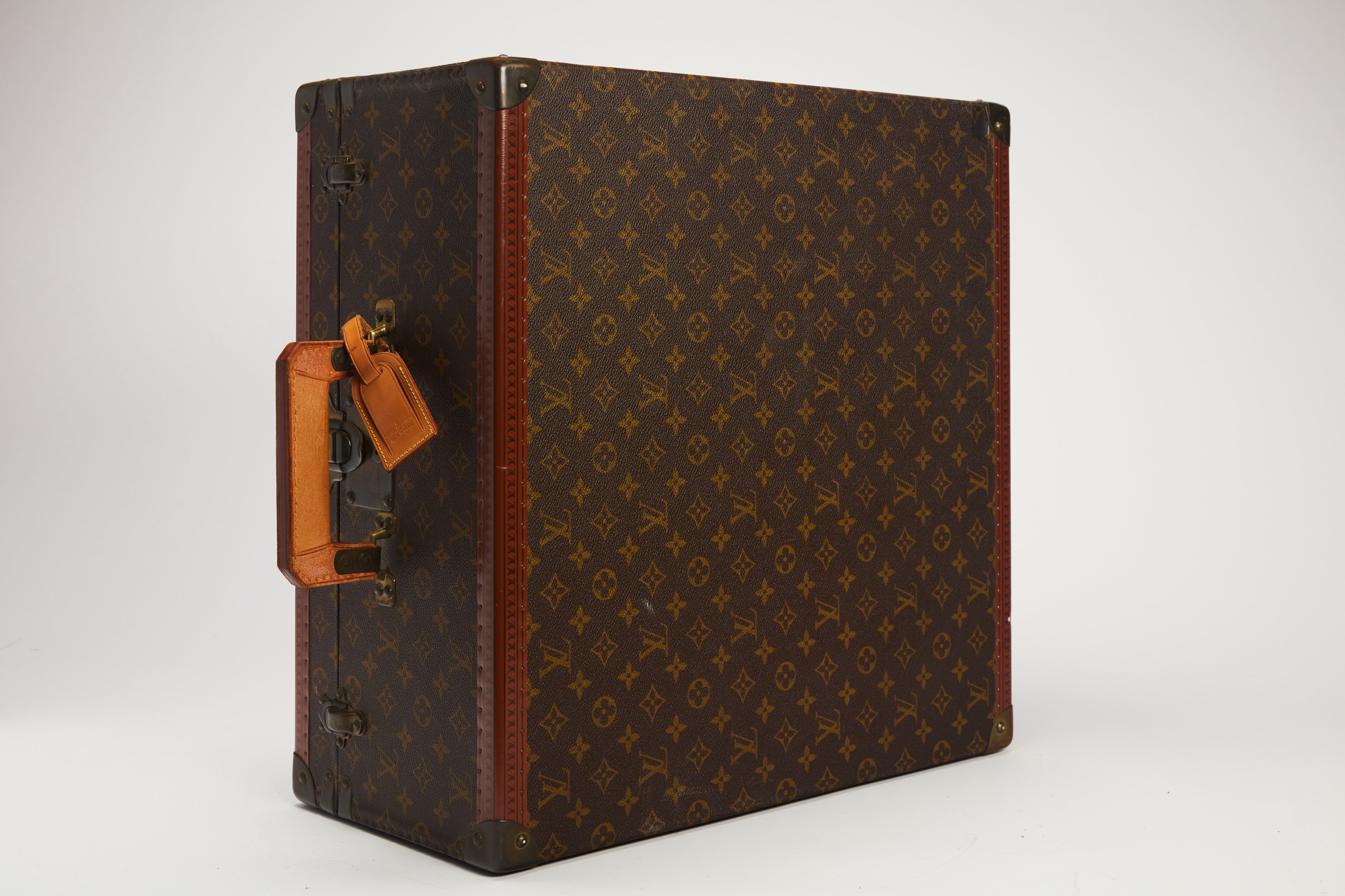 Louis Vuitton - Baule in tela monogram con profili e manico in cuoio