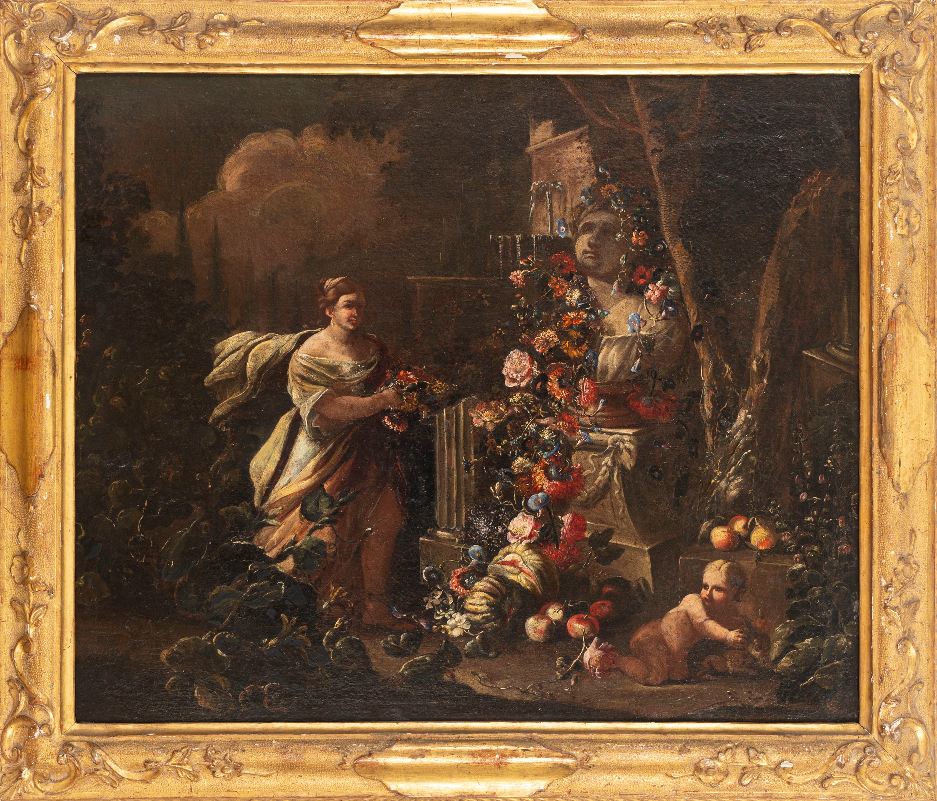 Trionfo di fiori e frutti in un giardino con donna che adorna una statua