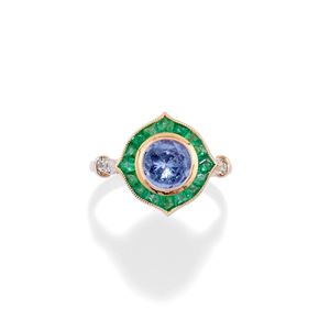 Anello con tanzanite lilla e smeraldi