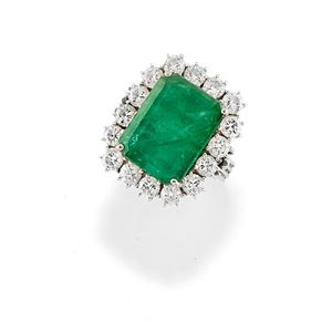 A 18K white gold, emerald and diamond ring